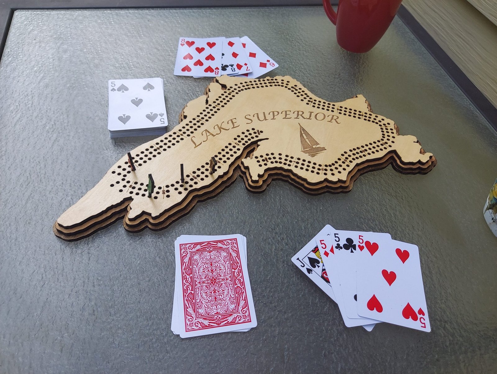 Lake Superior cribbage board, unique gift for great lakes lover or boating enthusiast. Custom themed pegs. Great for game night or wall art